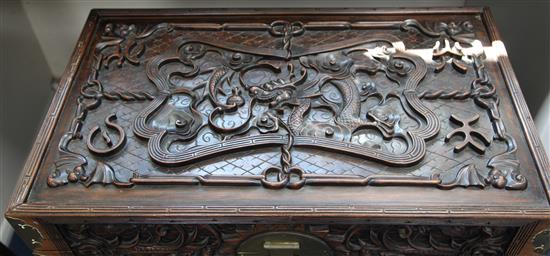 A Chinese zhangmu dragon chest, late 19th / early 20th century, W.79cm H.76cm D.47cm